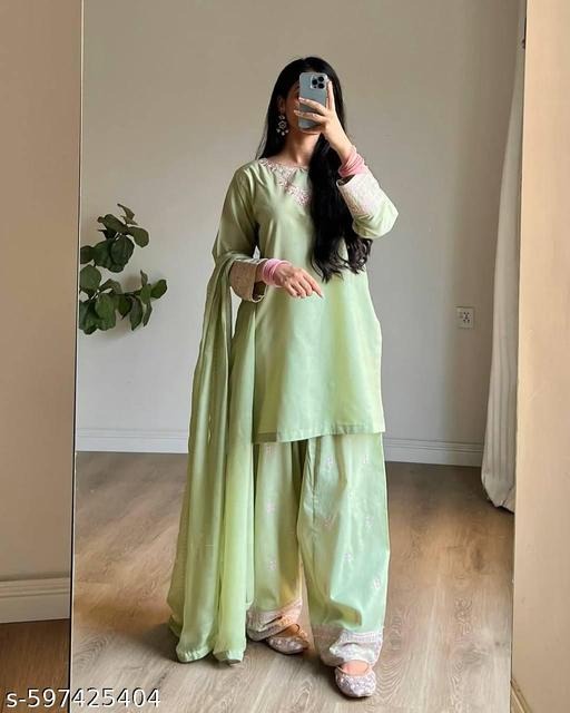 Glamorous Grace: Festive Attire Unveiled